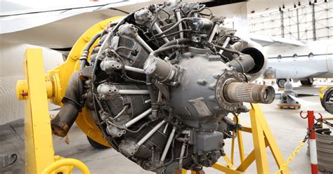 Wright R-3350 piston engine on display next to DC-7 airframe at Pima Air & Space Museum