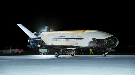 X-37B undergoing processing in the Orbiter Processing Facility at Kennedy Space Center
