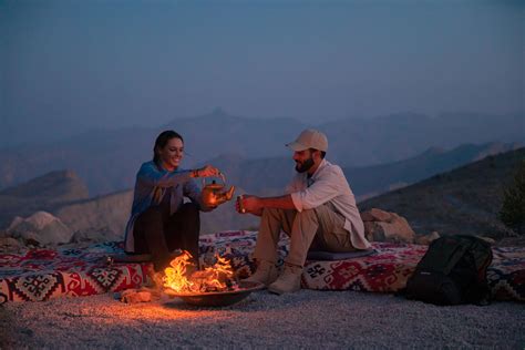 Yoga session at Camp 1770 overlooking Jebel Jais mountain sunrise