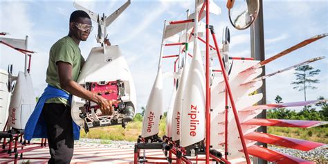 Zipline AI delivery drone transporting medical supplies over remote villages
